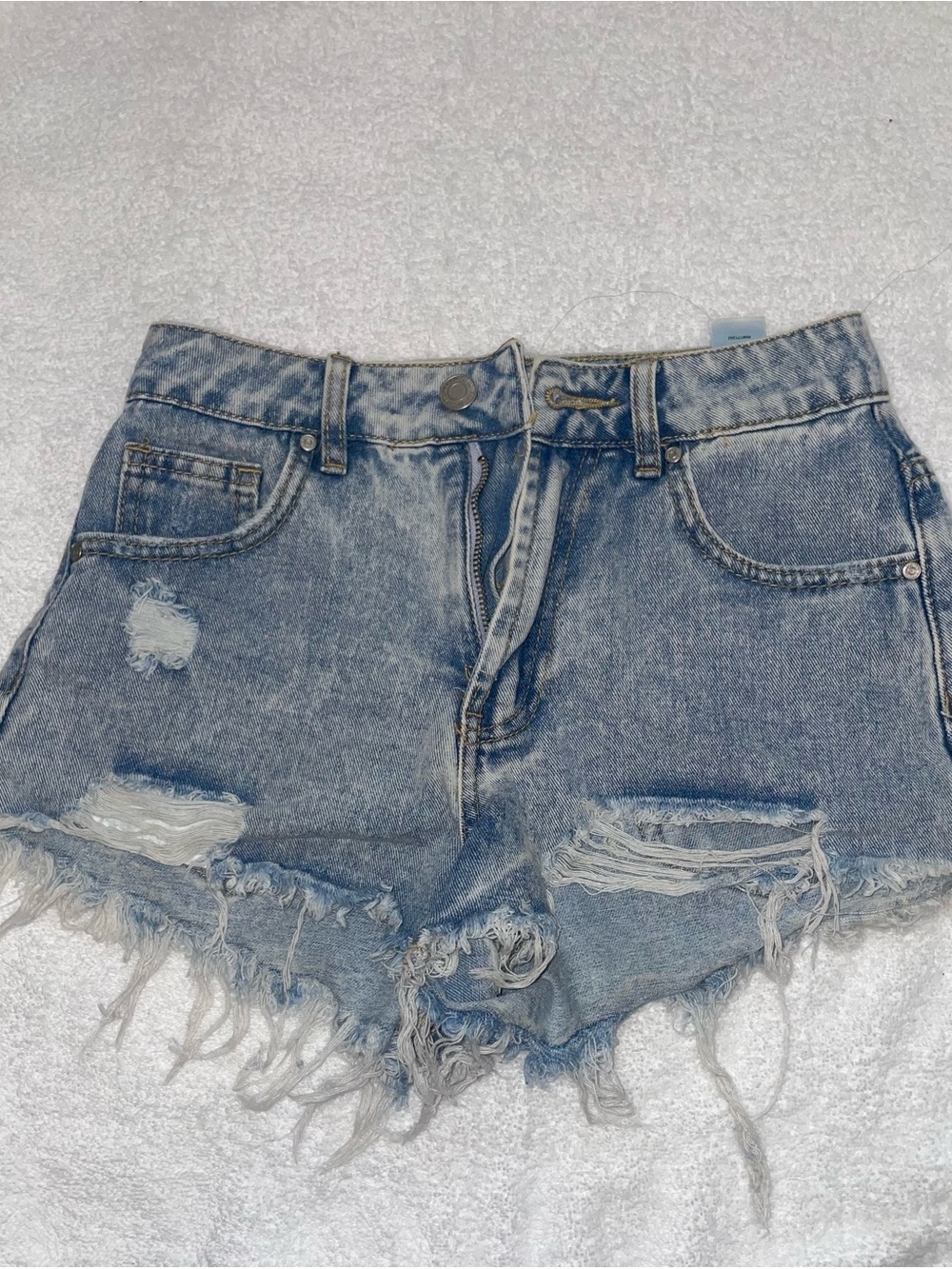 High-Rise Light Blue Distressed Denim Shorts
